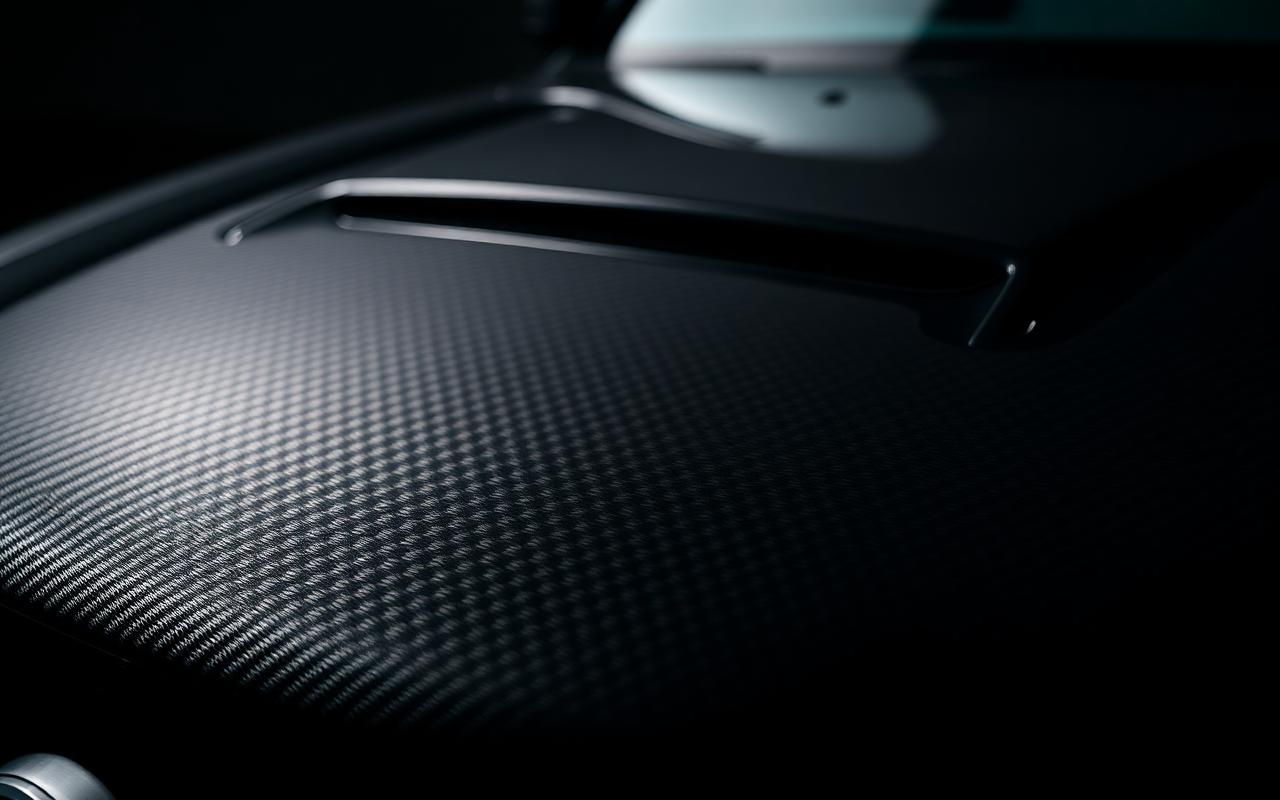 Jeep Grand Cherokee (WK2 / SRT) carbon fiber hood close-up — CFGMOD carbon fiber and fiberglass modification